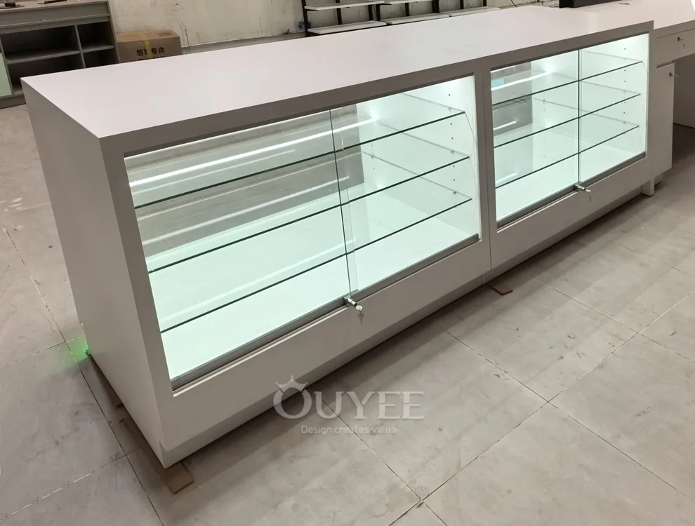 Long White Glass Showcase Counter with Green LED Kicklight