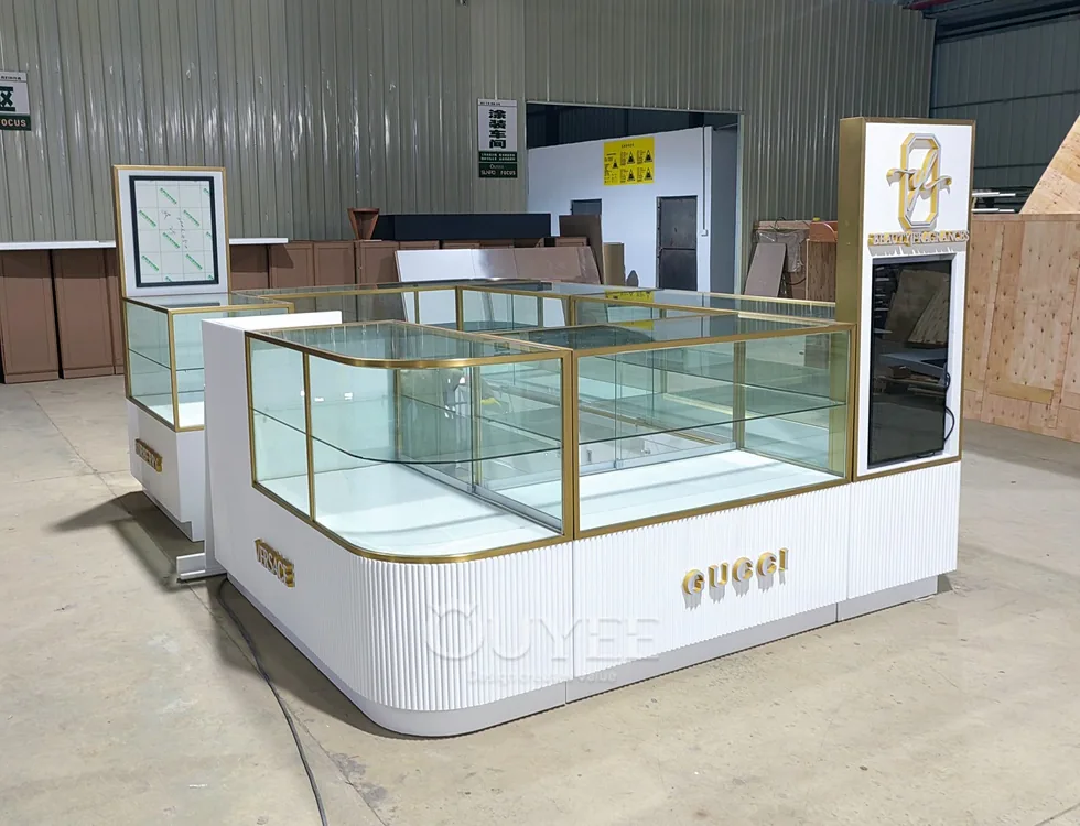 Conjunto de mostradores de isla con vitrina de vidrio curvado en blanco y dorado 02