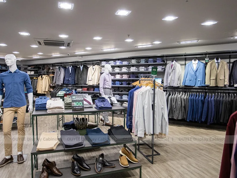 Fachada de tienda verde y exhibición en pared para ropa de hombre_10