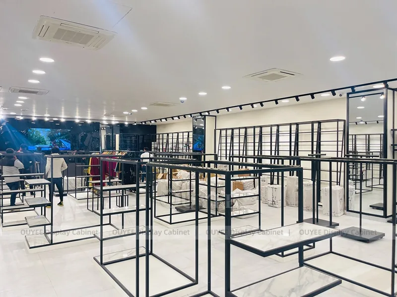 Minimal Black Apparel Showroom Rack System | Clothing Store Fixture