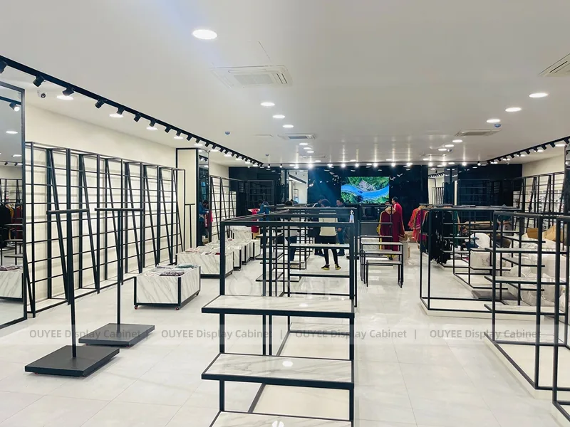 Minimal Black Apparel Showroom Rack System | Clothing Store Fixture