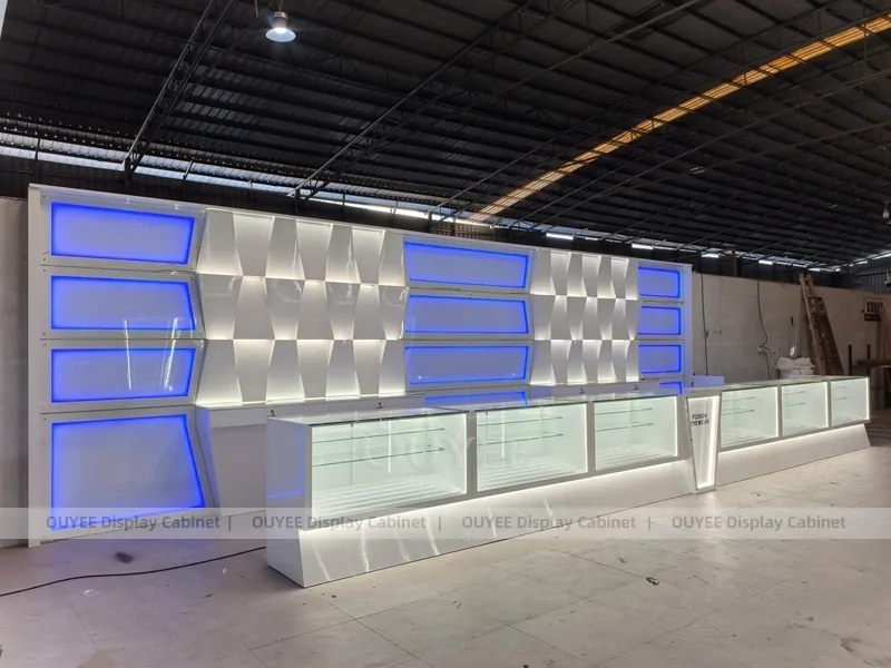 Blue LED Optical Display Wall with Glass Counters and Feature Panels_01