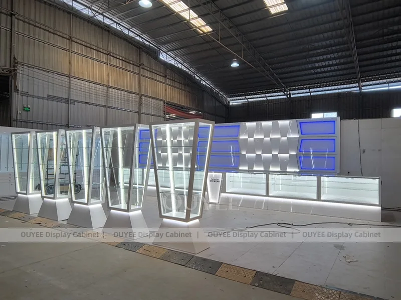Blue LED Optical Display Wall with Glass Counters and Feature Panels_07