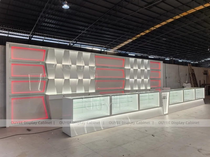Blue LED Optical Display Wall with Glass Counters and Feature Panels_08