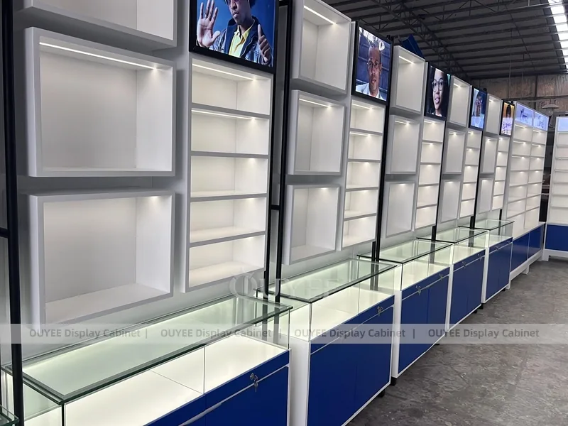 Branded Eyewear Display Wall with Blue Base Cabinets and Glass Counters_02