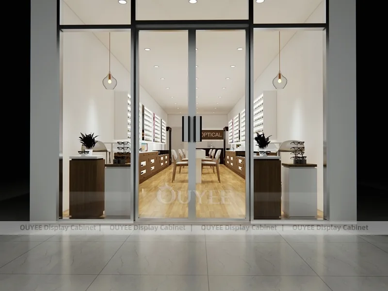 Glass Front Optical Storefront Design with Warm Interior Displays_01