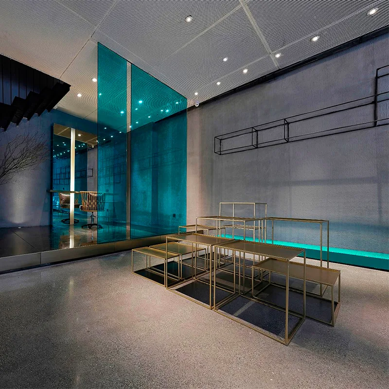 Industrial Salon Interior with Blue Feature Wall and Styling Chairs_05