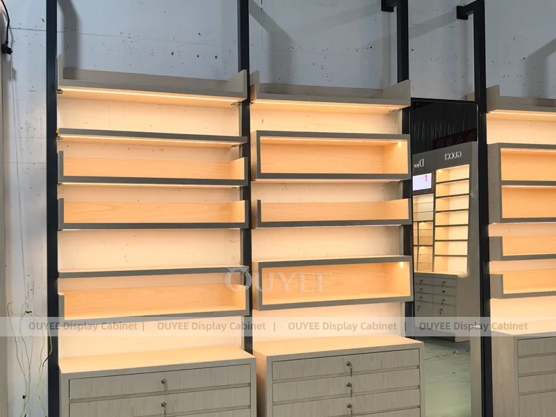 Luxury Optical Display Wall with Brand Panels and Accent Shelving_06
