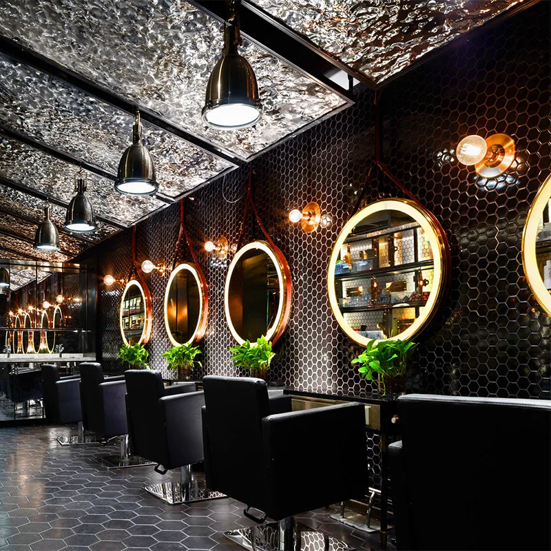 Modern Salon Interior with Circular Lighted Mirrors and Black Chairs_03