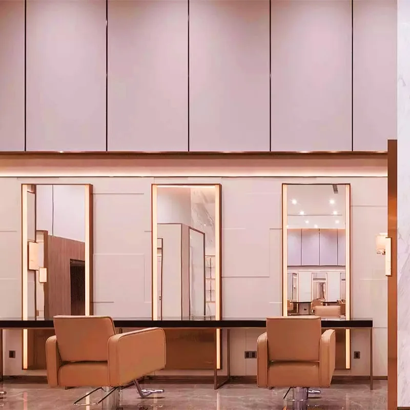 Zona styling facciata salone rosa con poltrone lounge_01