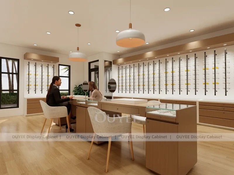 تصميم داخلي دافئ لمتجر نظارات خشبي مع طاولات استشارة وعروض جدارية_03