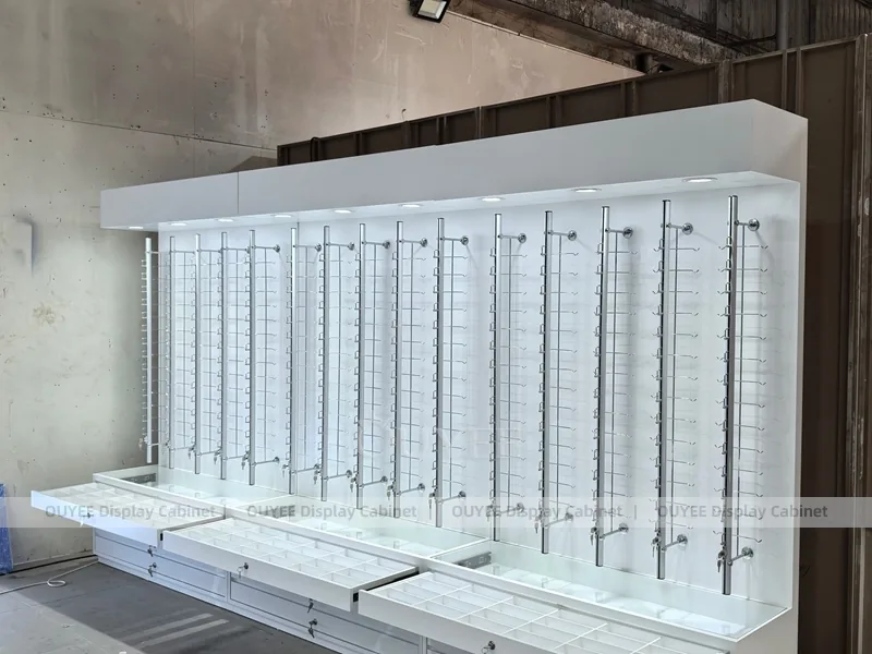 Mobile da parete bianco per esposizione occhiali con cassetto inferiore_02