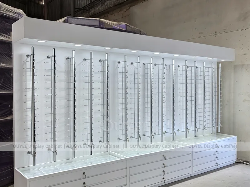 Mobile da parete bianco per esposizione occhiali con cassetto inferiore_06