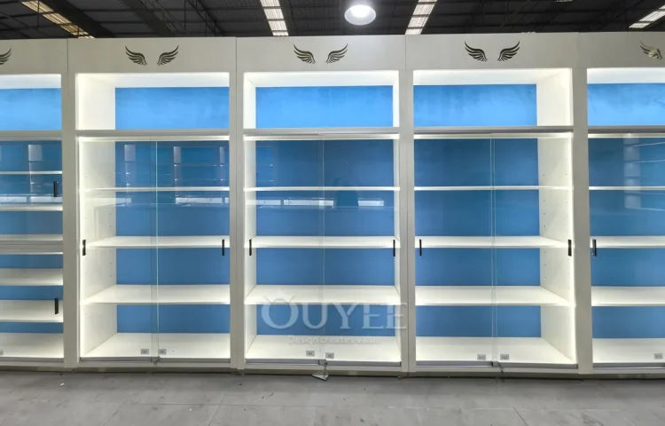 White Backlit Display Cabinet Wall with Blue Panels 01